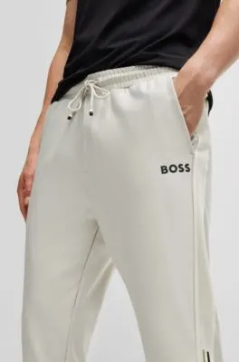 BOSS x Matteo Berrettini tracksuit bottoms with contrast tape and branding