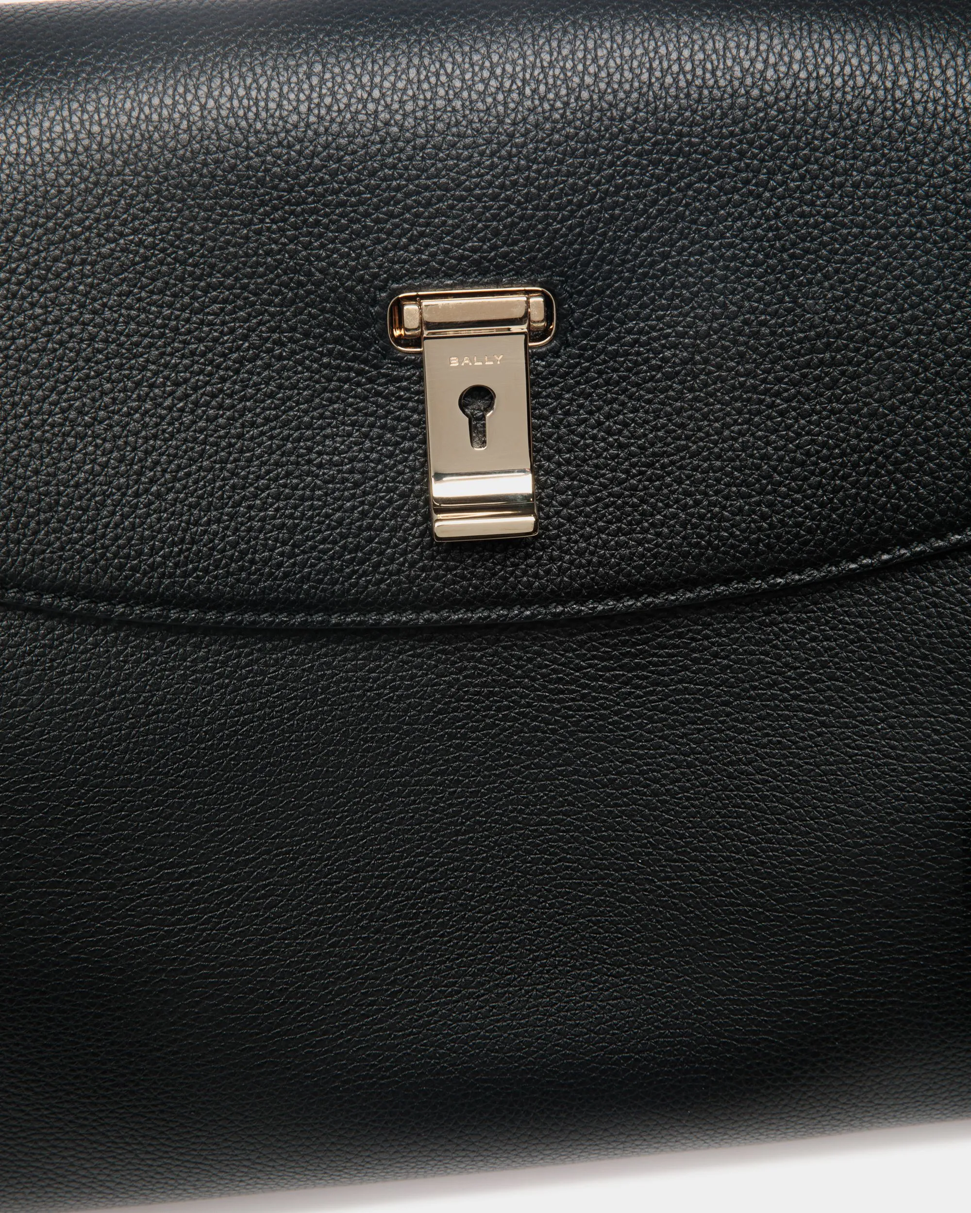 Lock Me Top Handle Bag In Black Grained Leather 