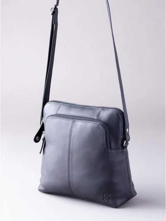 Raven Leather Cross Body Bag in Navy