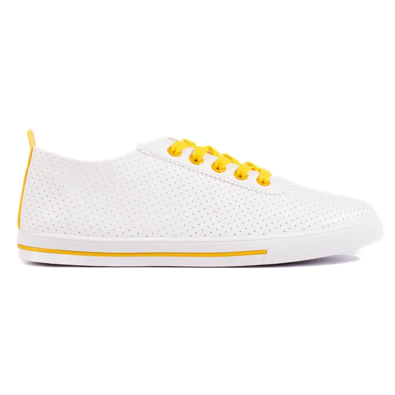 White women's sneakers with yellow laces